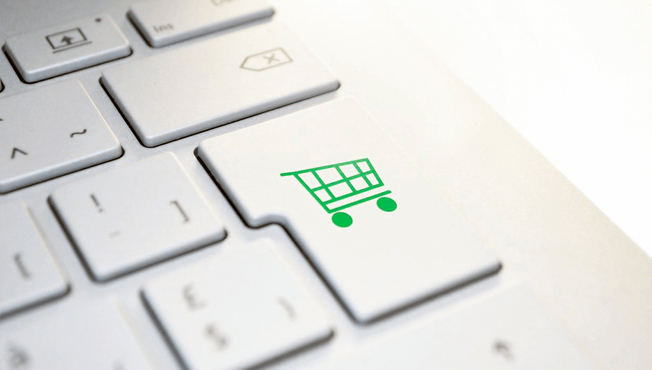 teclado de computadora con símbolo de compra