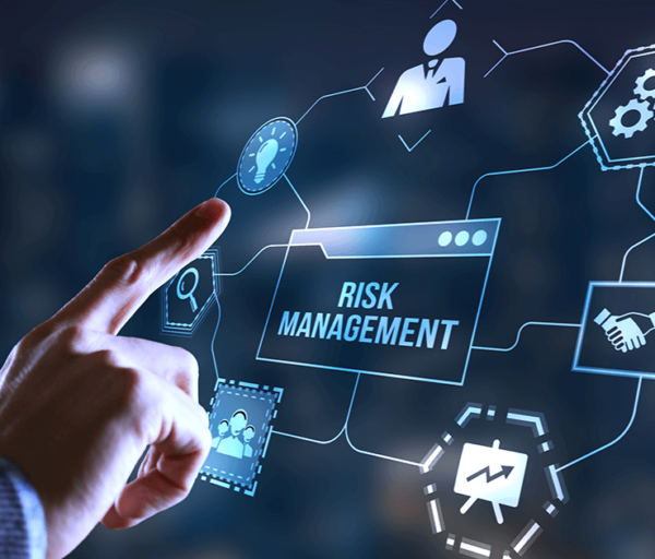 Image of an index finger interacting with a risk management hologram