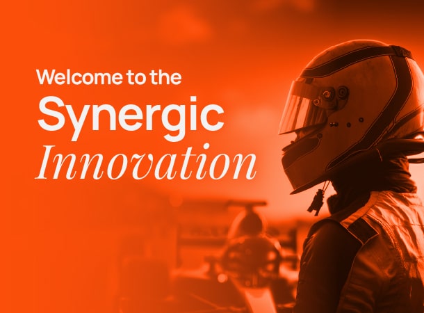 Image of a formula 1 pilot with the sentence welcome to the synergic innovation