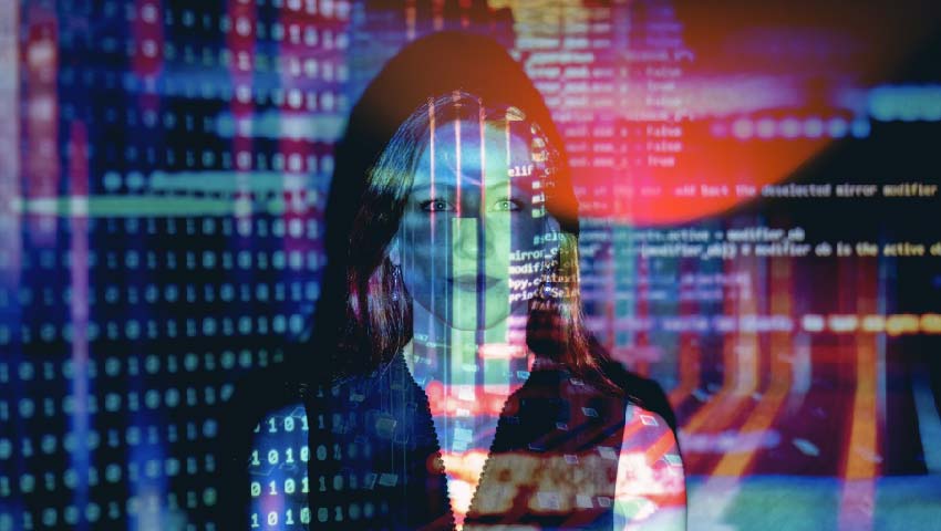 Woman on a technological background with an overlay of a programming code