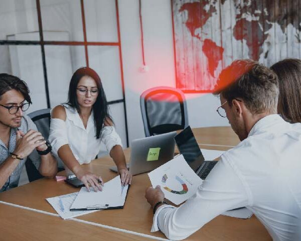 Young business people in formal clothes working in the office
