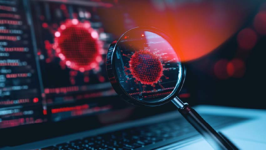 Infographic banner showing a corporate laptop screen with detailed antivirus detection graphs, with a magnifying lens focusing on a phishing malware alert
