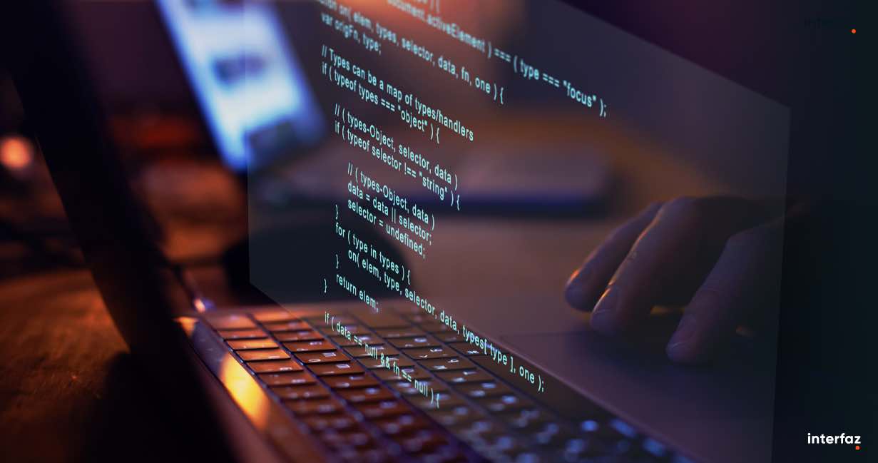 Person programming with laptop
